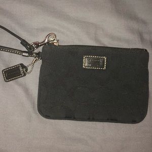 Coach Signature wristlet in black